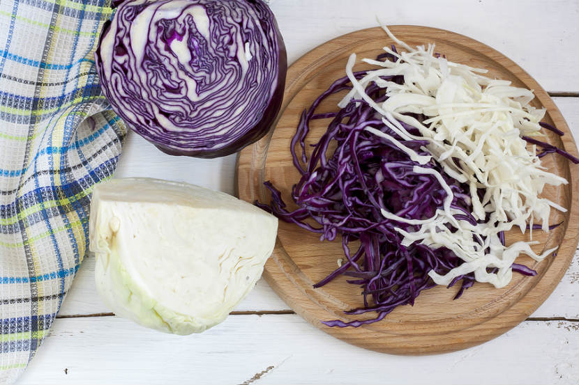 whole and chopped purple and white cabbage