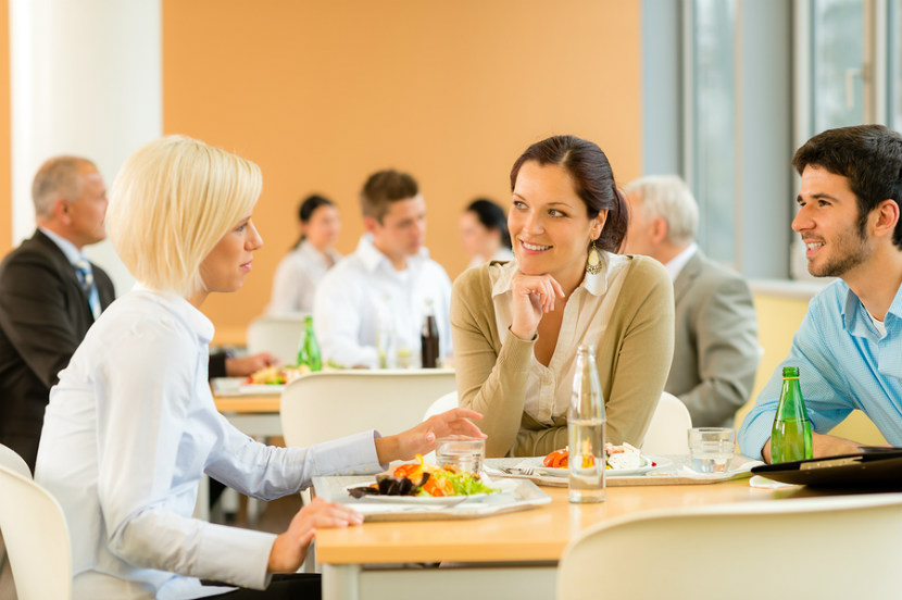 women eating in a cafeteria